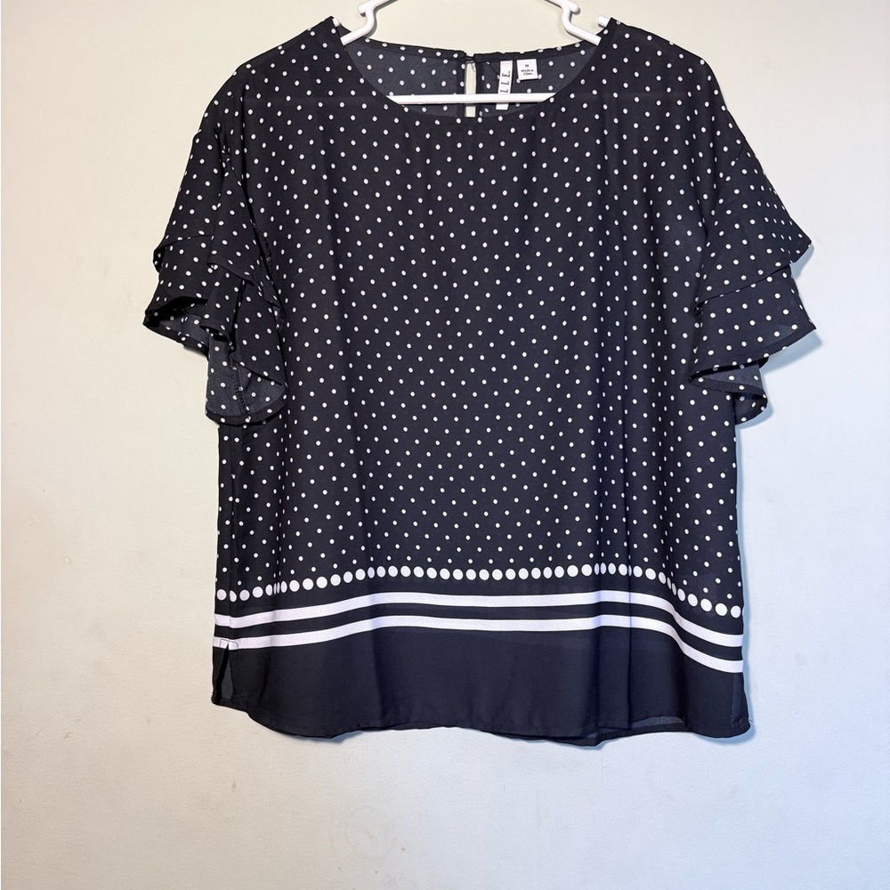 Elle Black Polka Dot Blouse with Ruffle Sleeves. Size M.